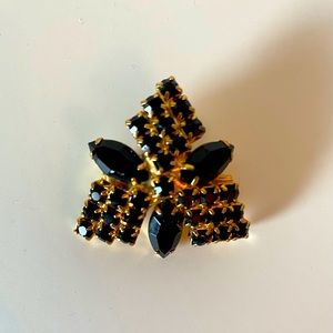Vintage black and gold brooch